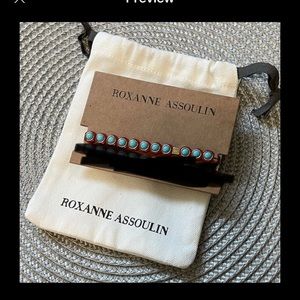 Roxanne Assoulin Enamel coated stretch bracelet with a gold tone logo